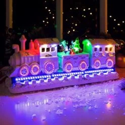 The Christmas Workshop Multi-Coloured 82800 Animated Train & Ice Skating Ornament | Light Up Room Decoration | 10 X LED Lights | 24cm X 16cm X 17cm -National Tree Company Sale Shop 51Qm04PBWyL. AC