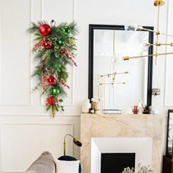 Kuimen Artificial Christmas Teardrop Swag,Green,Based On Natural Grape Vines, Bell, Artificial Pine, Parsley, Holly Leaves, Red Berries, Dead Branches, Used For Christmas Decoration (Multicolor) -National Tree Company Sale Shop 51TMOYxV7VL