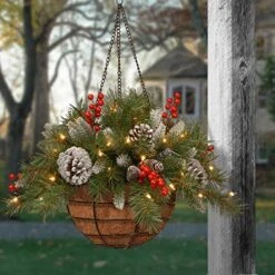 National Tree Company Pre-Lit Artificial Hanging Basket, , Decorated With Frosted Pine Cones, Berry Clusters, White LED Lights, Christmas Collection, 20 Inches