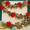 Juegoal Christmas Garland, 9 FT Pre-lit Artificial Xmas Flocked Garlands, Lighted Poinsettia Spruce Garland With Ornament, Battery Operated With Lights, For Garden Home Winter New Year Decorations