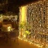 JMEXSUSS 300 LED Remote Control Curtain Lights, Plug In Fairy Curtain Lights Outdoor, Window Wall Hanging Curtain String Light For Bedroom Backdrop Wedding Party Garden Indoor Decoration (Warm White) 2 JMEXSUSS 300 LED Remote Control Curtain Lights, Plug In Fairy Curtain Lights Outdoor, Window Wall Hanging Curtain String Light For Bedroom Backdrop Wedding Party Garden Indoor Decoration (Warm White) -National Tree Company Sale Shop 61uDrsHzqYL